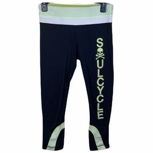 Lululemon black and yellow skull soul cycle crops